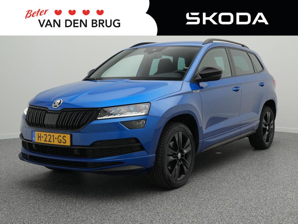 Skoda Karoq 1.5 TSI 150pk AUTOMAAT Sportline Business | Trek, Auto's, Stof, 4 cilinders, Blauw, Bedrijf