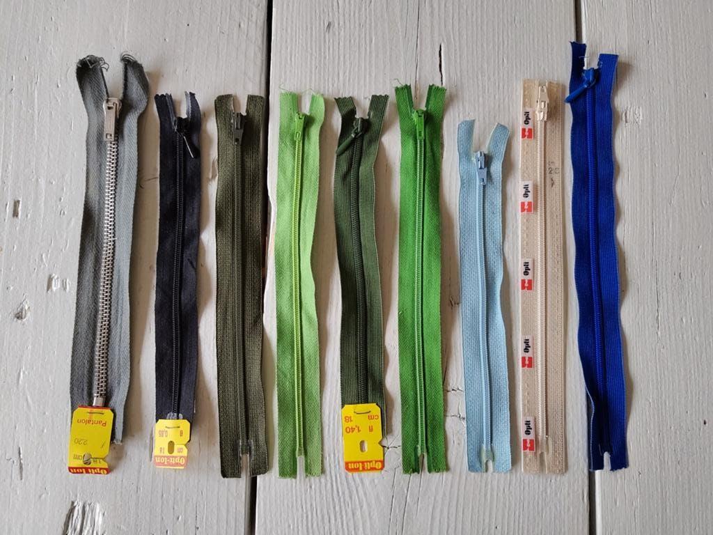 9 Mooie Opti ritsen in groen- en blauwtinten, ecru/zand, Ophalen of Verzenden, Nieuw, Rits of Sluiting