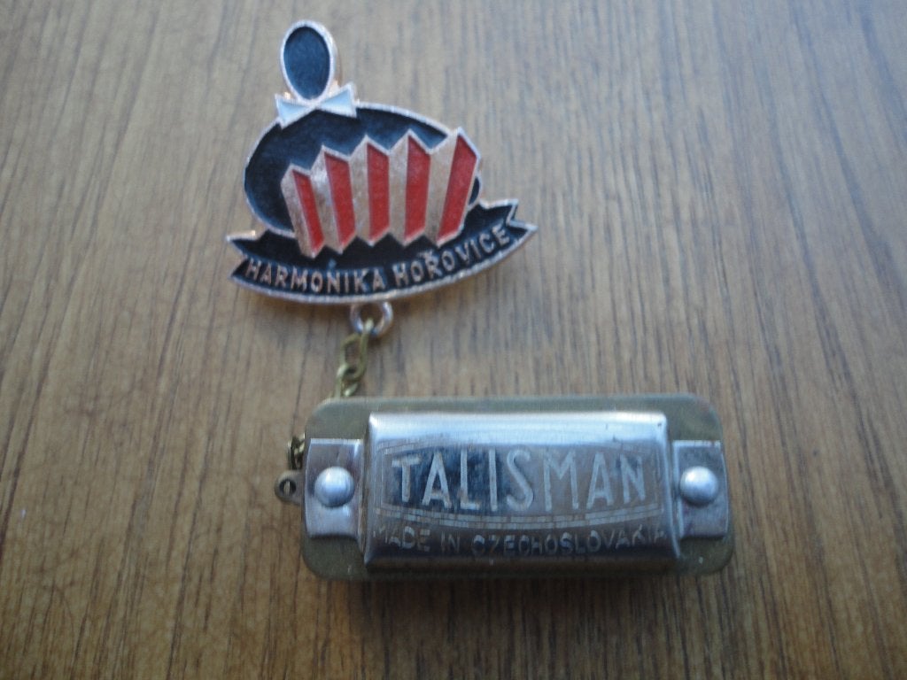 Broche c.q. speld met mini mondharmonica (3 cm), Ophalen of Verzenden, Gebruikt, Merk, Speldje of Pin