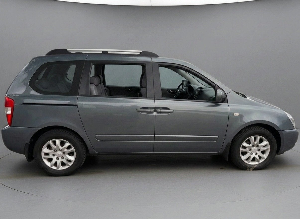 Kia Carnival 2.7 EX Automaat|Clima|Cruise|Leder|7P|Nap!, Auto's, Gebruikt, Stoelverwarming, 2000 kg, 120 €/maand