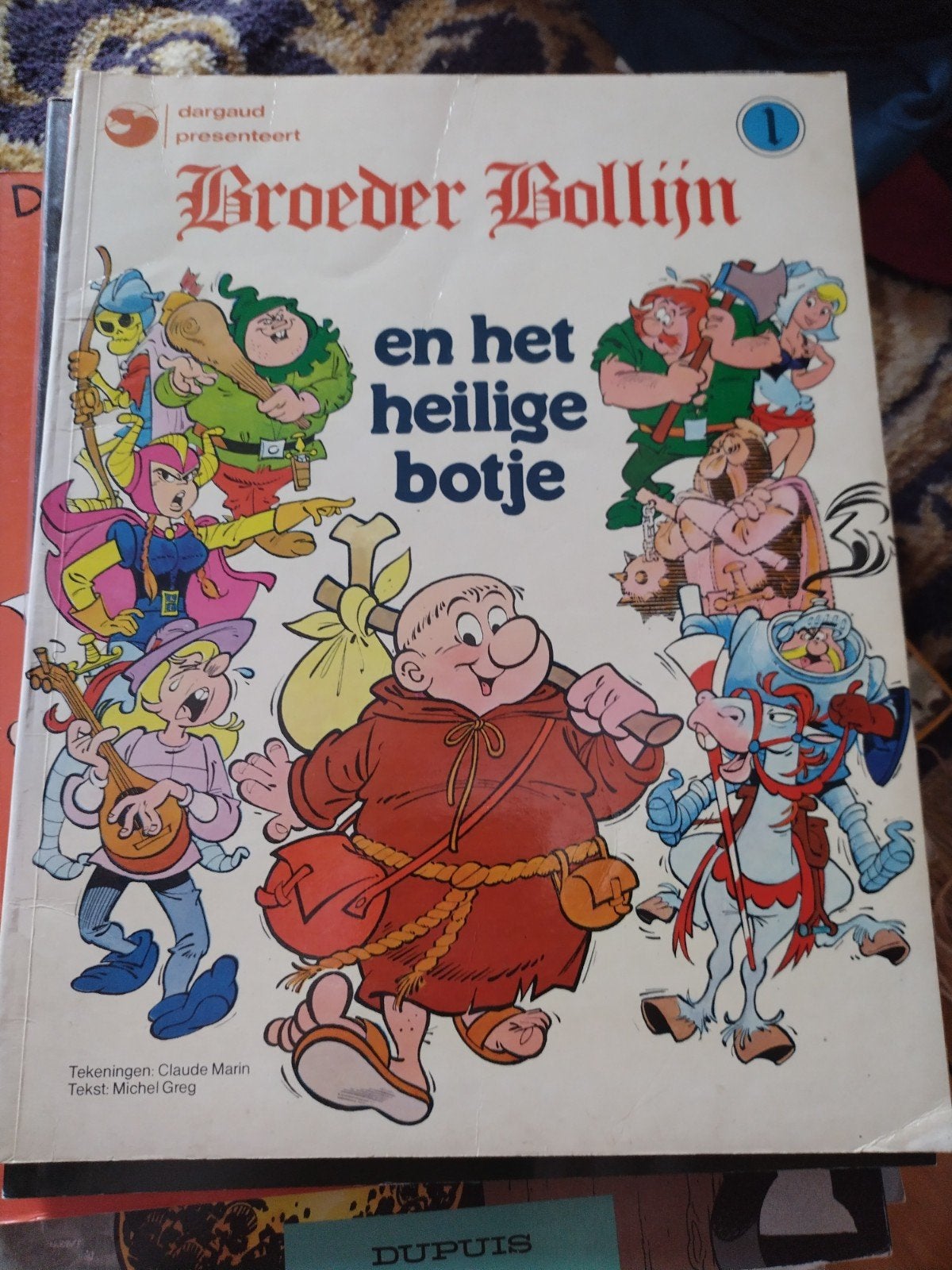 Broeder Bollijn en het heilige botje, Eén stripboek, Ophalen of Verzenden, Claude Marin, Michel Greg