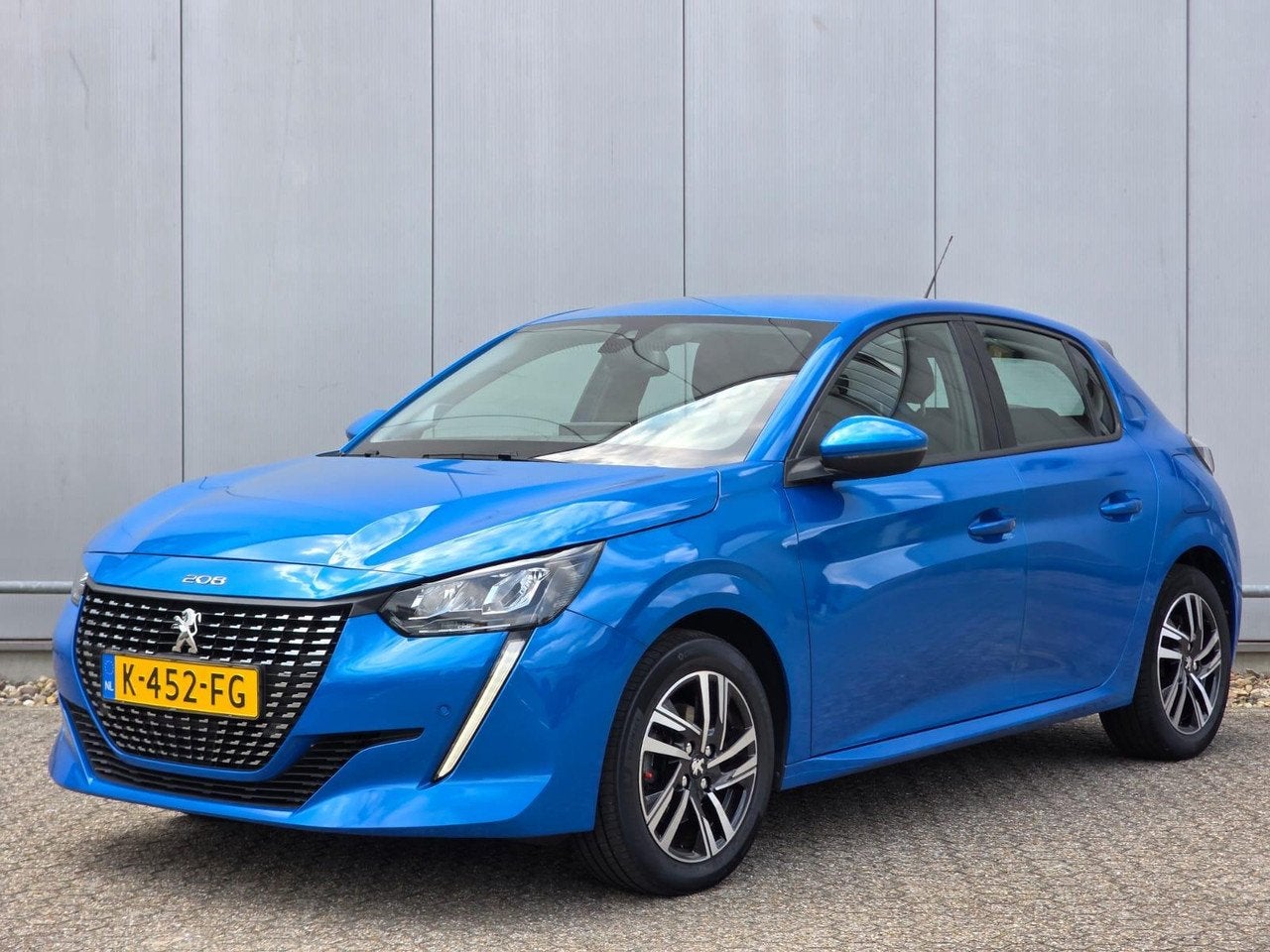 Peugeot 208 100pk Allure | Camera | Parkeersensoren | Naviga, Voorwielaandrijving, 101 pk, Gebruikt, Blauw