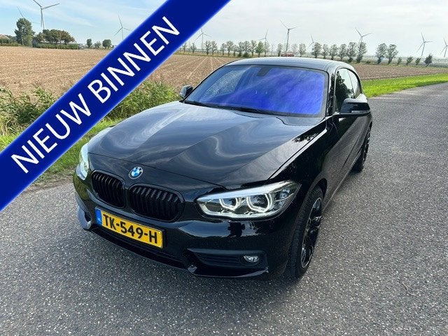 BMW 1-serie 118i Executive Navigatie CC Pdc Enz (bj 2018), Auto's, Euro 6, 4 stoelen, Zwart, Origineel Nederlands