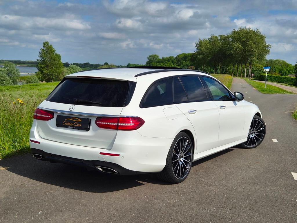 Mercedes-Benz E-klasse Estate 400 4MATIC AMG | 1e Eigenaar, Auto's, Mercedes-Benz, Automaat, Gebruikt, Wit, Leder