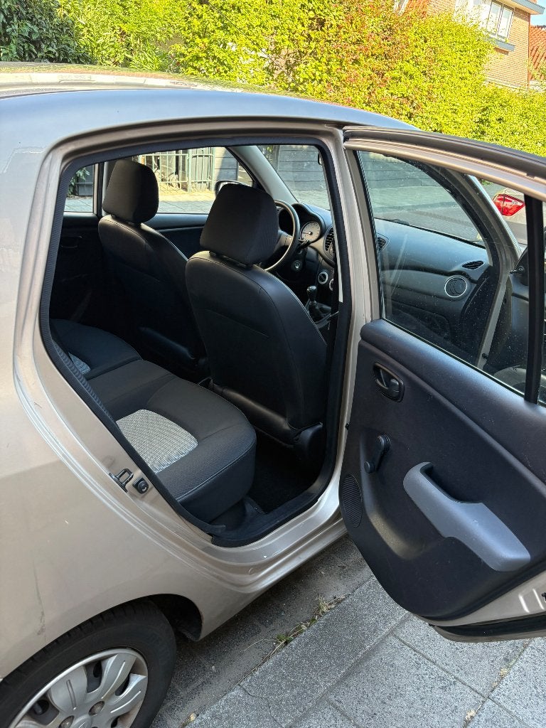 Hyundai i10 1.25 I 5DR 2010 Beige, Voorwielaandrijving, 31 €/maand, 4 cilinders, Origineel Nederlands