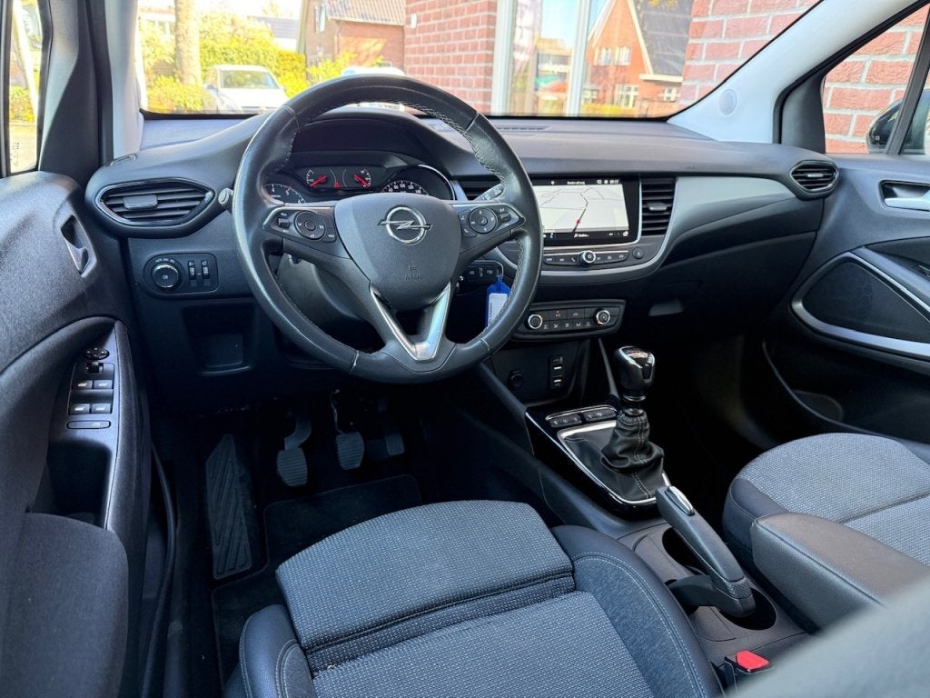 Opel Crossland 1.2 T. Bns Edition TREKHAAK / CAMERA / AIRCO, Auto's, 21 km/l, Gebruikt, 1199 cc, Wit