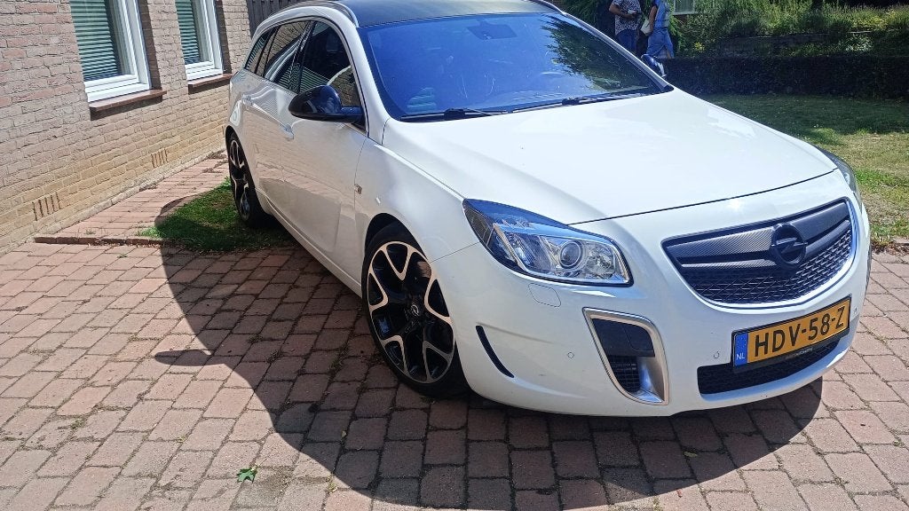Opel Insignia 2.8 V6 Turbo Sportswagon 360pk 4x4 2012 Wit, Auto's, Zwart, 360 pk, Wit, Leder