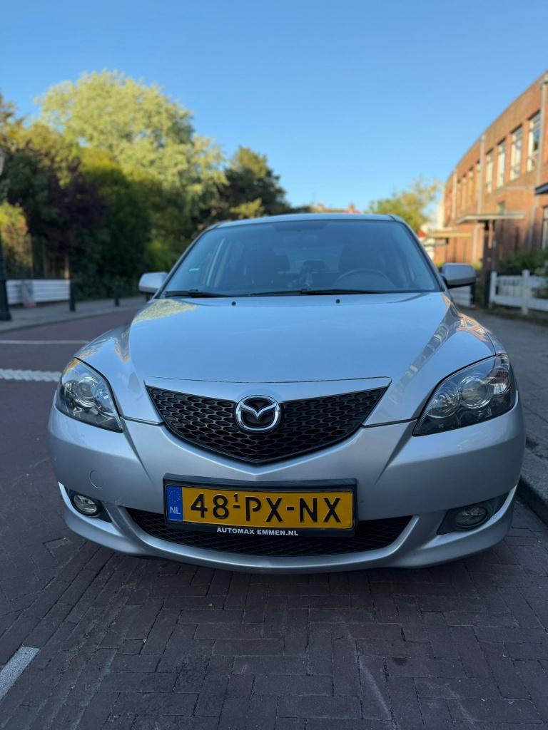 Mazda 3 1.6 Hatchback AUT 2005 Grijs, Auto's, Mazda, 4 cilinders, Origineel Nederlands, 1200 kg, Particulier