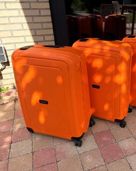 2 Samsonite S'Cure Spinner 69/25 Koffer - Oranje, Sieraden, Tassen en Uiterlijk, Koffers, Ophalen, Zo goed als nieuw, Uitschuifbare handgreep
