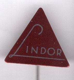 Lindor kleding winkels blik speldje ( Z_185), Ophalen of Verzenden, Zo goed als nieuw, Merk, Speldje of Pin
