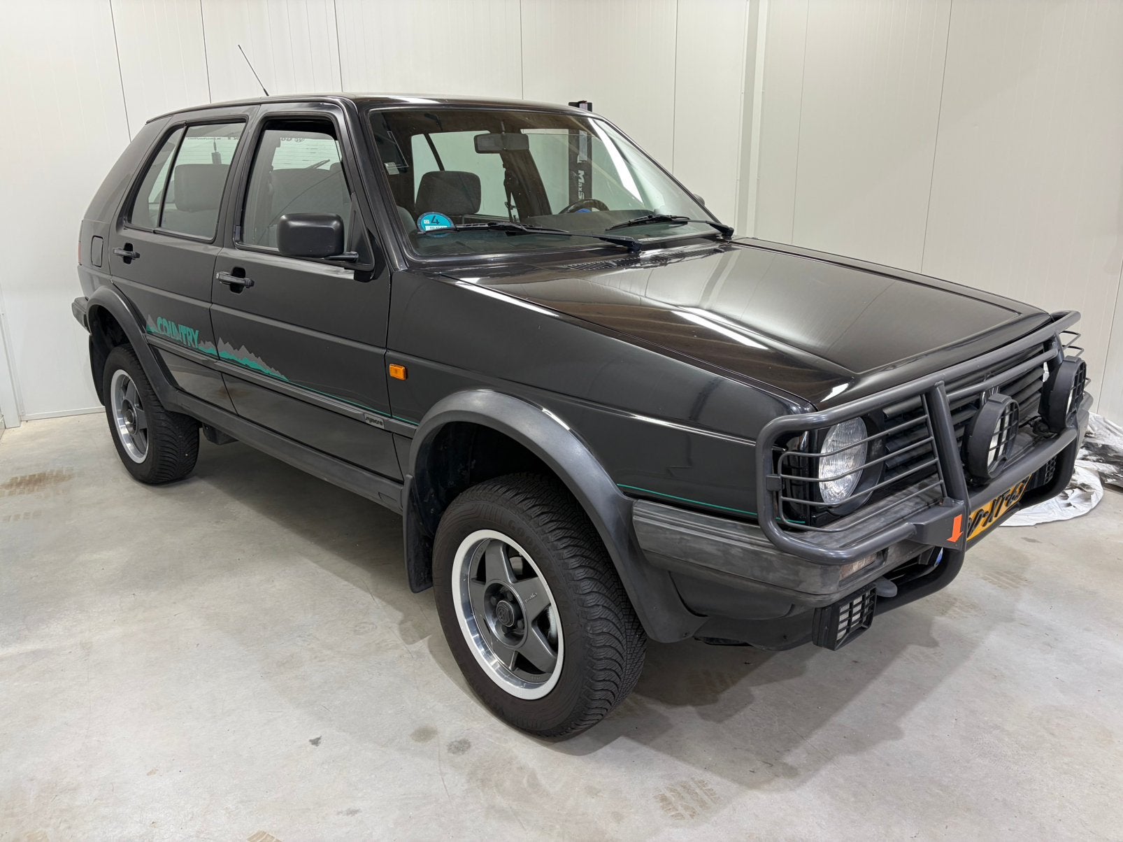 Volkswagen Golf 1.8 CL Country Syncro 72KW U9 1991 Zwart, Stof, 40 €/maand, 4 cilinders, Zwart
