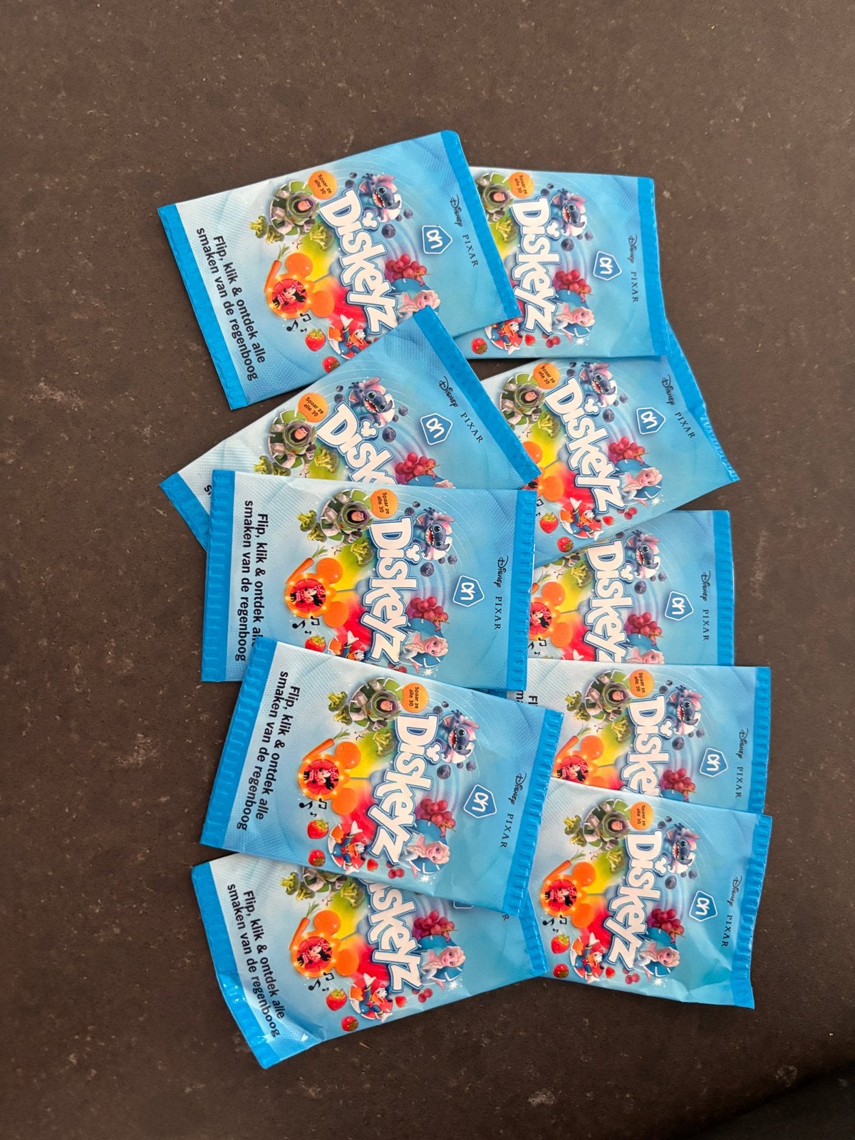 Disney Pixar Diskeyz - 10 zakjes, Verzamelen, Ophalen of Verzenden, Verschillende figuren, Nieuw, Overige typen