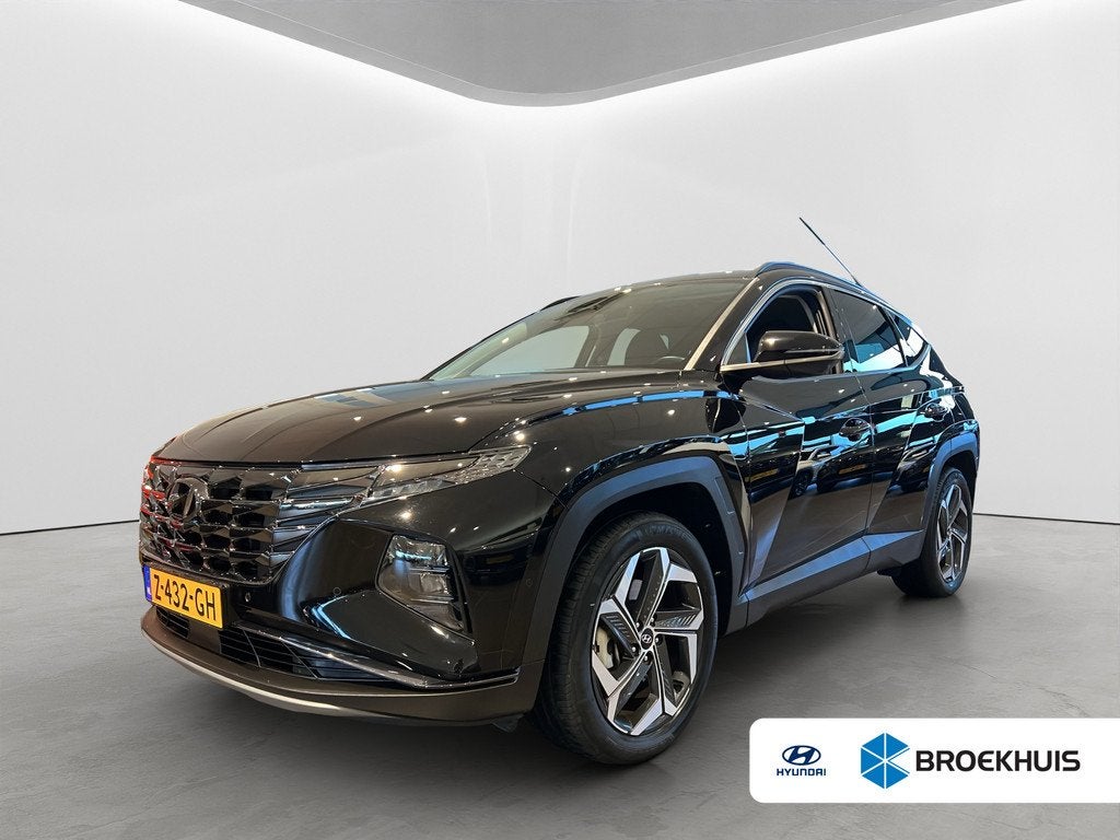 Hyundai Tucson 1.6 T-GDI 265pk PHEV Premium 4WD, Gebruikt, 4 cilinders, Zwart, Bedrijf