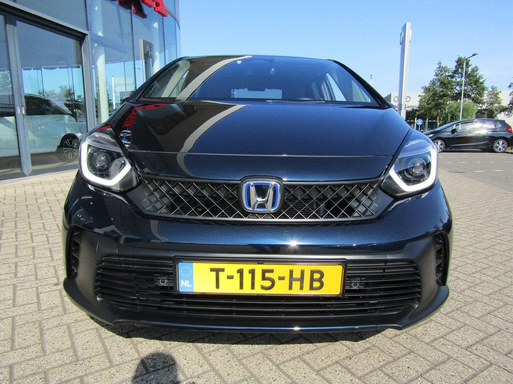Honda Jazz 1.5 i-MMD 122pk Hybrid CVT Advance, Auto's, Honda, Automaat, 4 cilinders, Blauw, Leder en Stof