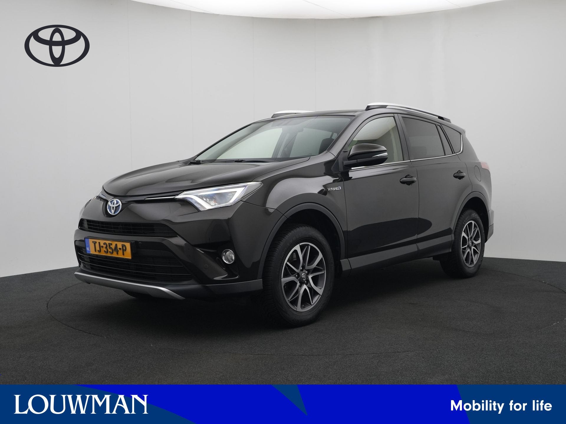 Toyota RAV4 2.5 Hybrid Executive Business (bj 2016), 12 maanden, Gebruikt, Zwart, Leder