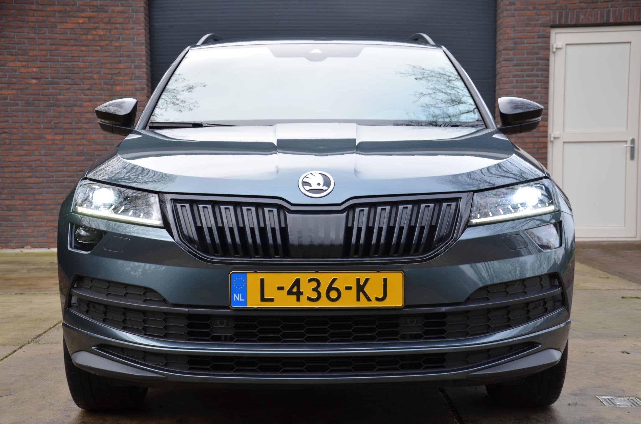 Skoda Karoq 1.5 TSI ACT Sportline Business Automaat/Navi/Led, Auto's, Stof, 4 cilinders, Bedrijf, 19 km/l