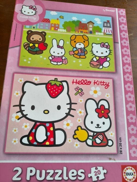 Hello Kitty Puzzels - 2 stuks van 20 stukjes, Ophalen of Verzenden, 10 tot 50 stukjes, Gebruikt