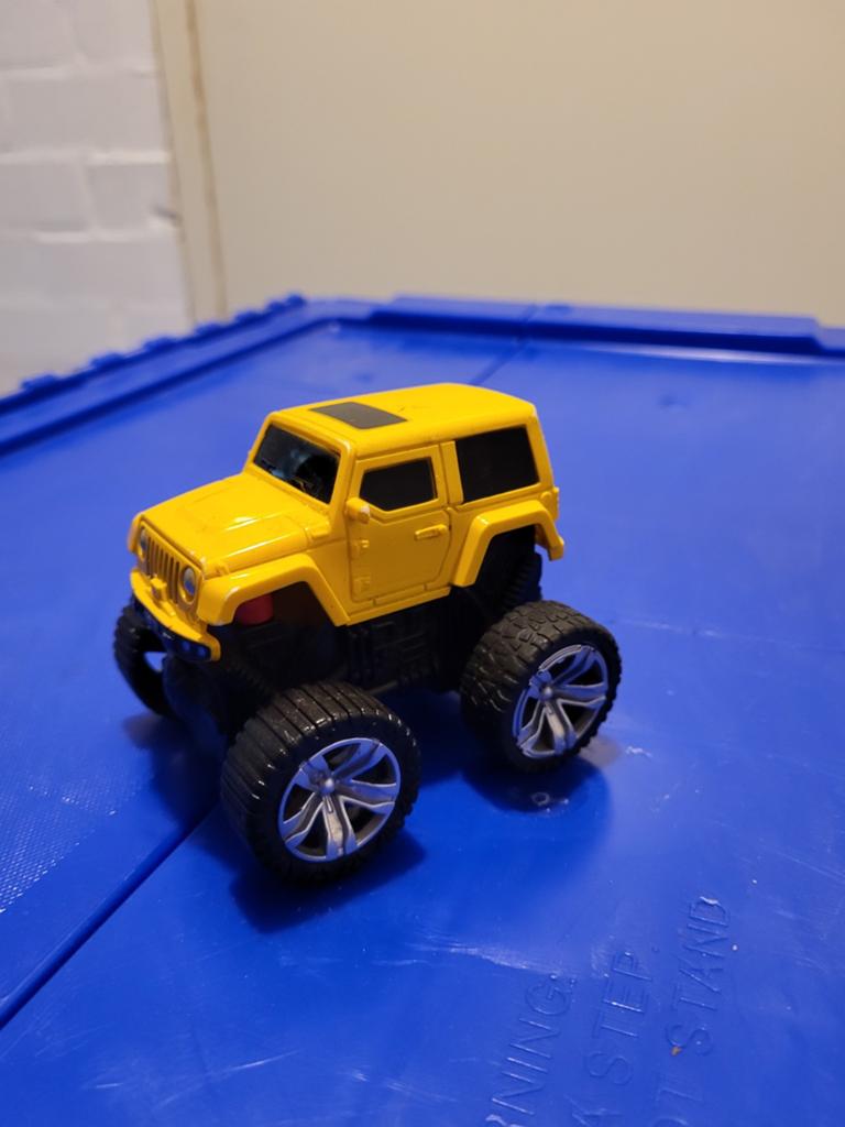 Gele speelgoed Jeep Wrangler - Monster Truck, Ophalen of Verzenden, Gebruikt