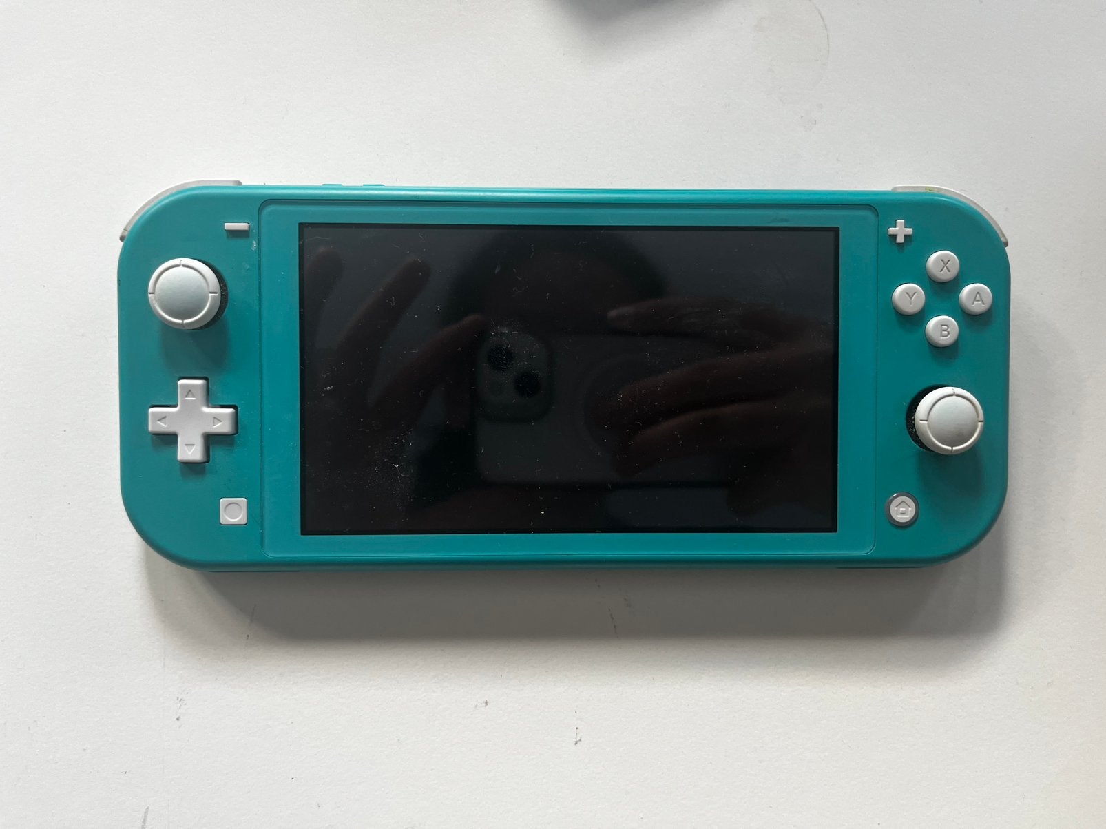 Nintendo Switch Lite Turquoise met minecraft en hoes, Spelcomputers en Games, Ophalen, Turquoise, Zo goed als nieuw, Met beschermhoes of tas