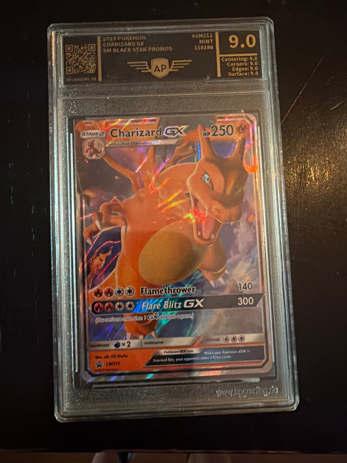 Pokémon Charizard GX SM Black Star Promos PSA 9.0, Ophalen of Verzenden, Zo goed als nieuw, Losse kaart