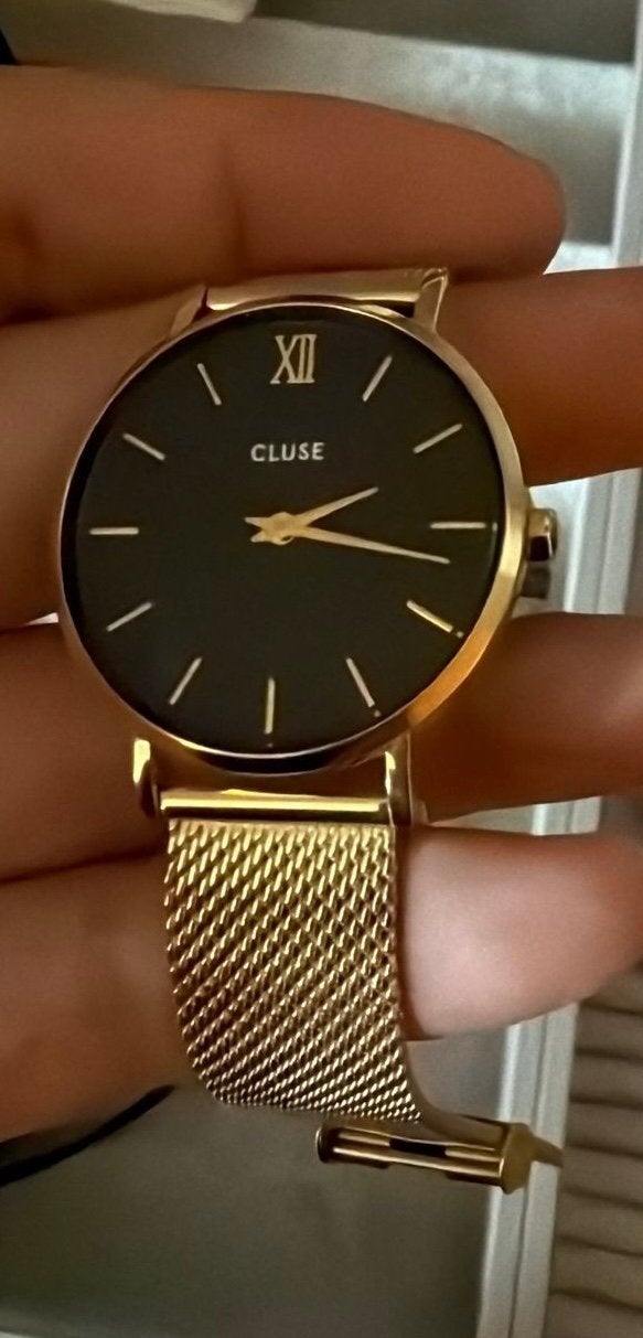 Cluse horloge met zwarte wijzerplaat en goudkleurig bandje, Ophalen of Verzenden, Zo goed als nieuw, Staal, Overige merken