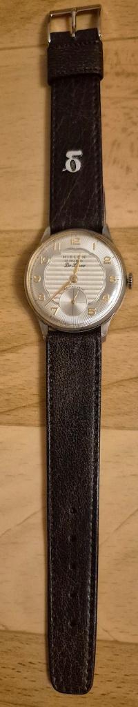 Hislon vintage herenhorloge, handopwinder., Sieraden, Tassen en Uiterlijk, Horloges | Antiek, Overige merken, Staal, Met bandje