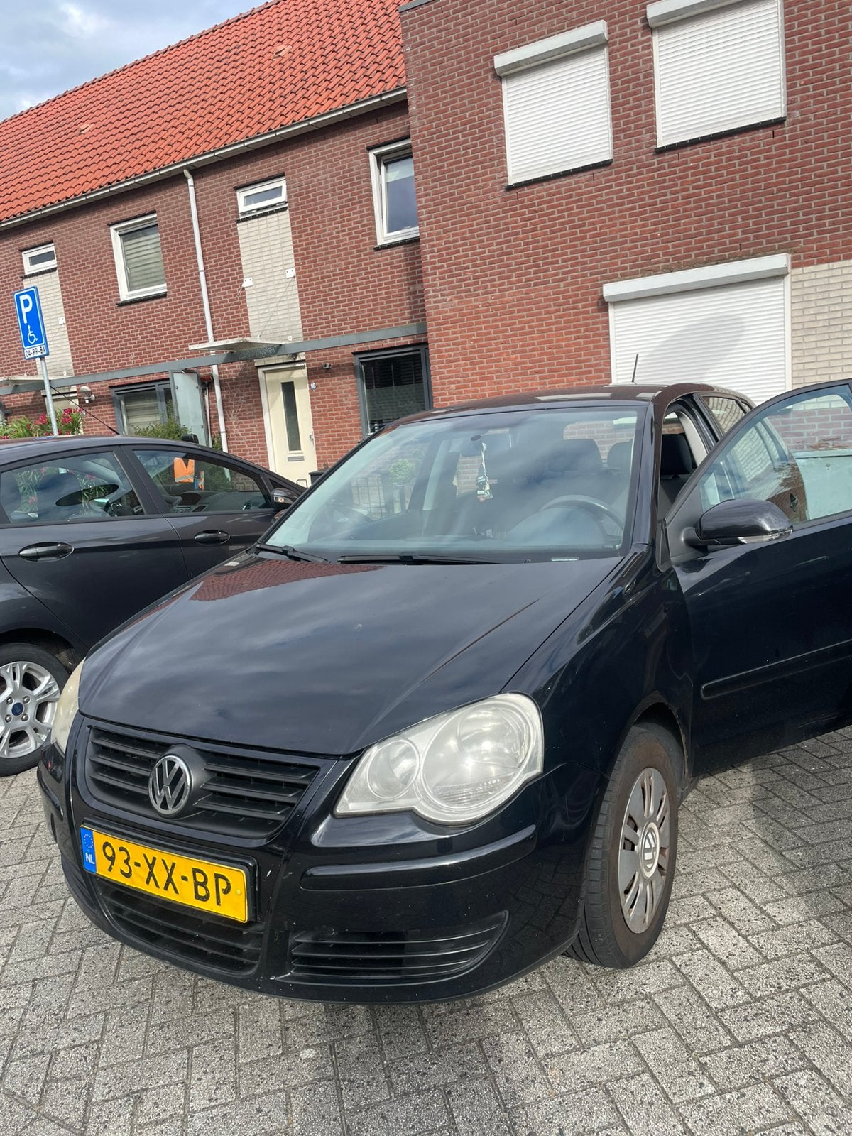 Volkswagen Polo 1.4 16V 59KW AUT 2007 Zwart, Auto's, Volkswagen, Zwart, 4 cilinders, Overige bekleding, Zwart
