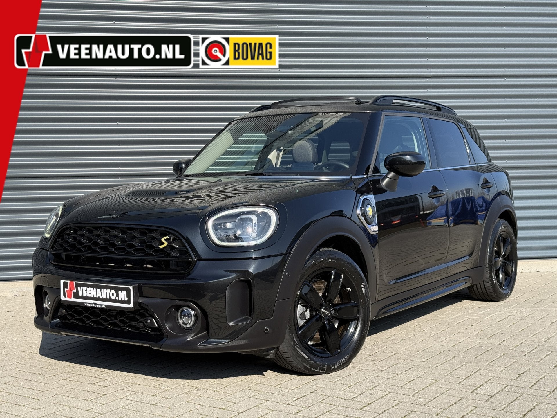 MINI Countryman 2.0 Cooper SE ALL4 Pano/H&K/Camera/Apple, Auto's, Gebruikt, Zwart, Countryman, Leder en Stof