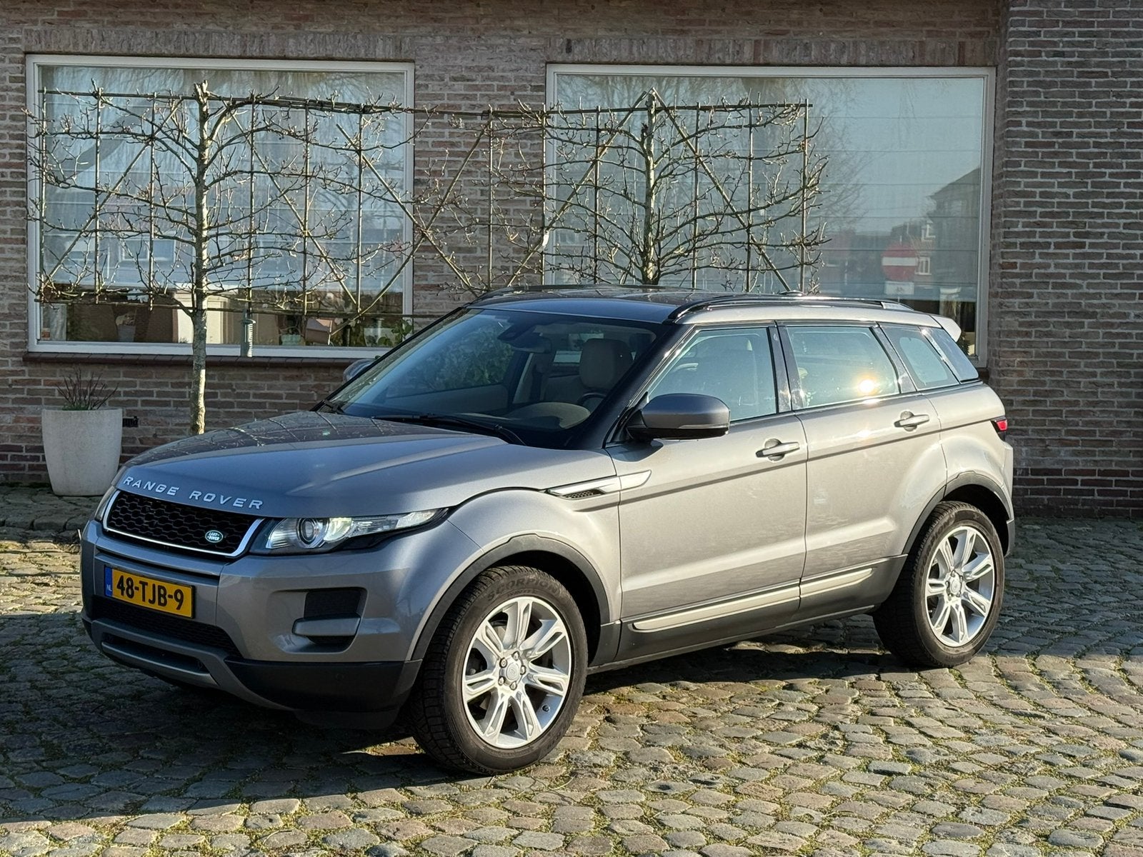 Range Rover Evoque 2.0 Si4 Automaat|Nieuwe motor|CarPlay, Auto's, Automaat, Beige, Leder, Vierwielaandrijving