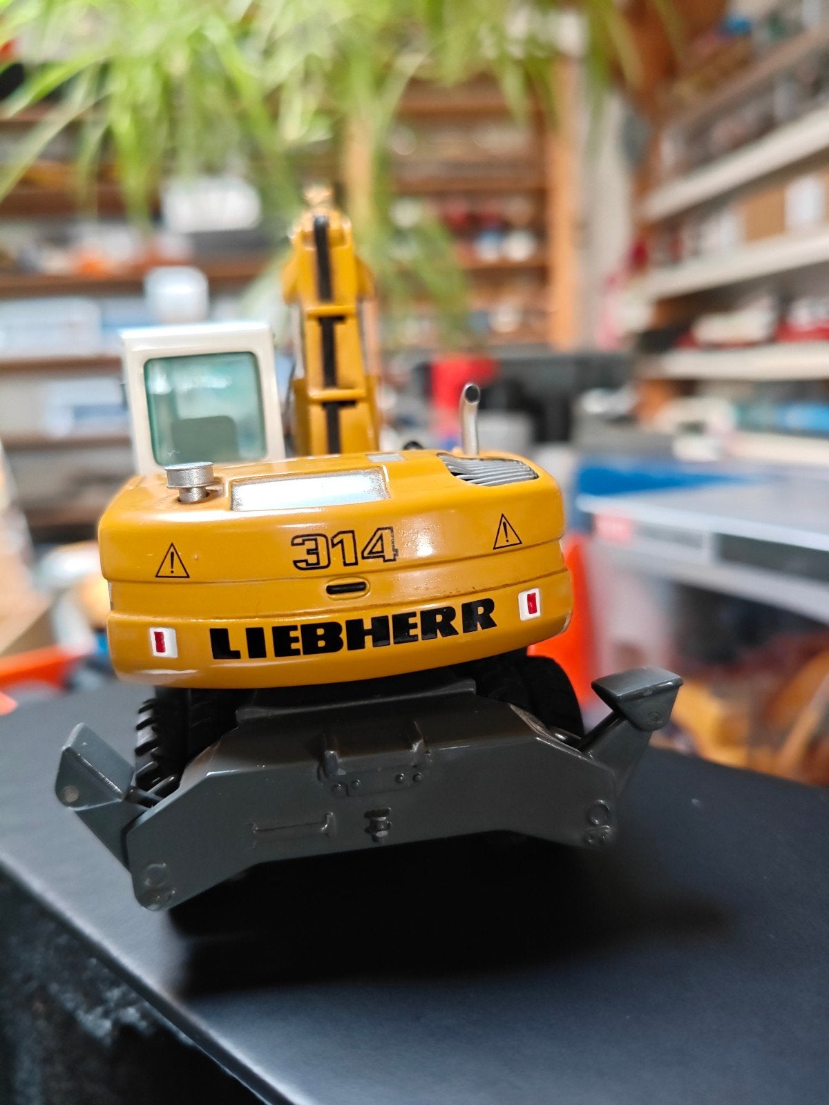 Liebherr 314 met schuifblad, Ophalen of Verzenden, Zo goed als nieuw, Hijskraan, Tractor of Landbouw, Overige merken