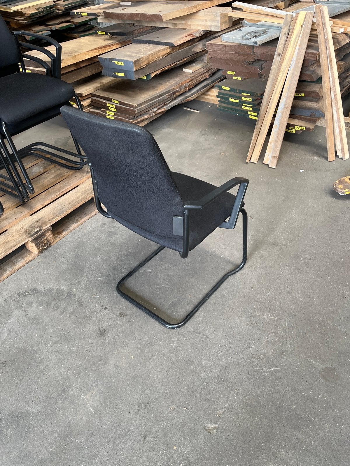7 mooie stapelbare stoelen met stoffen zitting en leuning, Ophalen, Gebruikt, Zwart, Stof