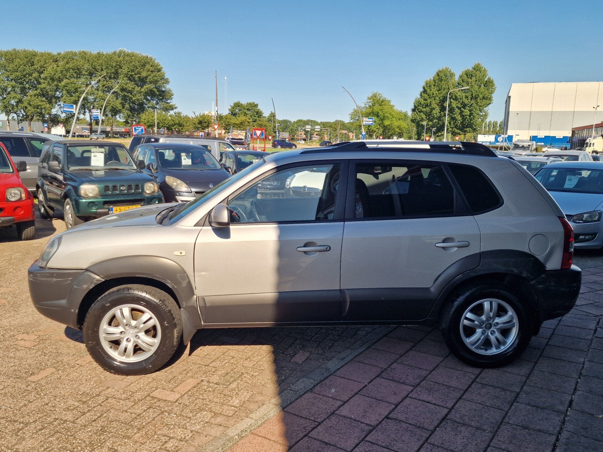 Hyundai Tucson 2.0i Dynamic Sense - Airco - Cruise -, Auto's, Stof, Gebruikt, Zwart, 4 cilinders