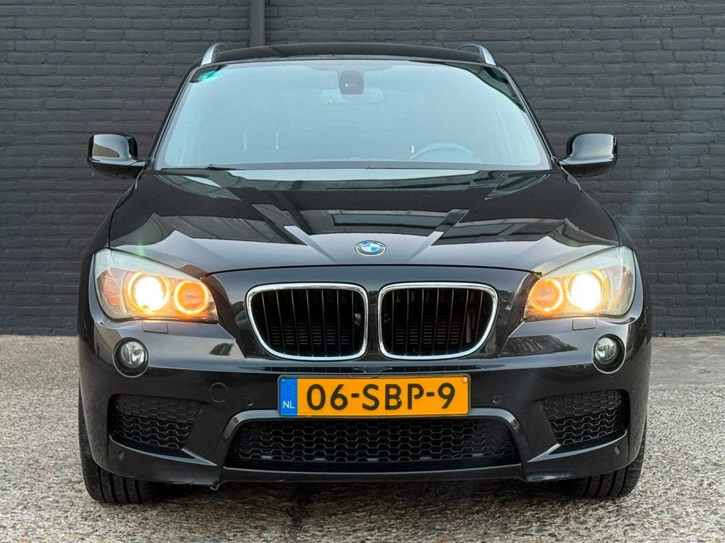 BMW X1 SDrive18i M SPORTPAKKET|NAVI|AIRCO|PDC | TREKHAAK | E, Auto's, X1, Euro 5, Zwart, 4 cilinders