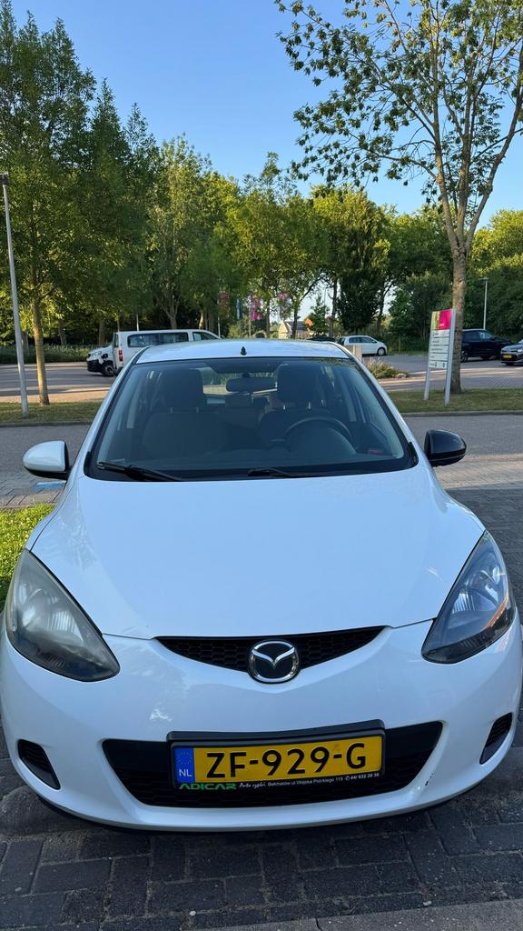 Mazda 2 1.3 55KW 5DRS 2010 Wit, Auto's, Mazda, Voorwielaandrijving, 74 pk, 4 cilinders, Wit