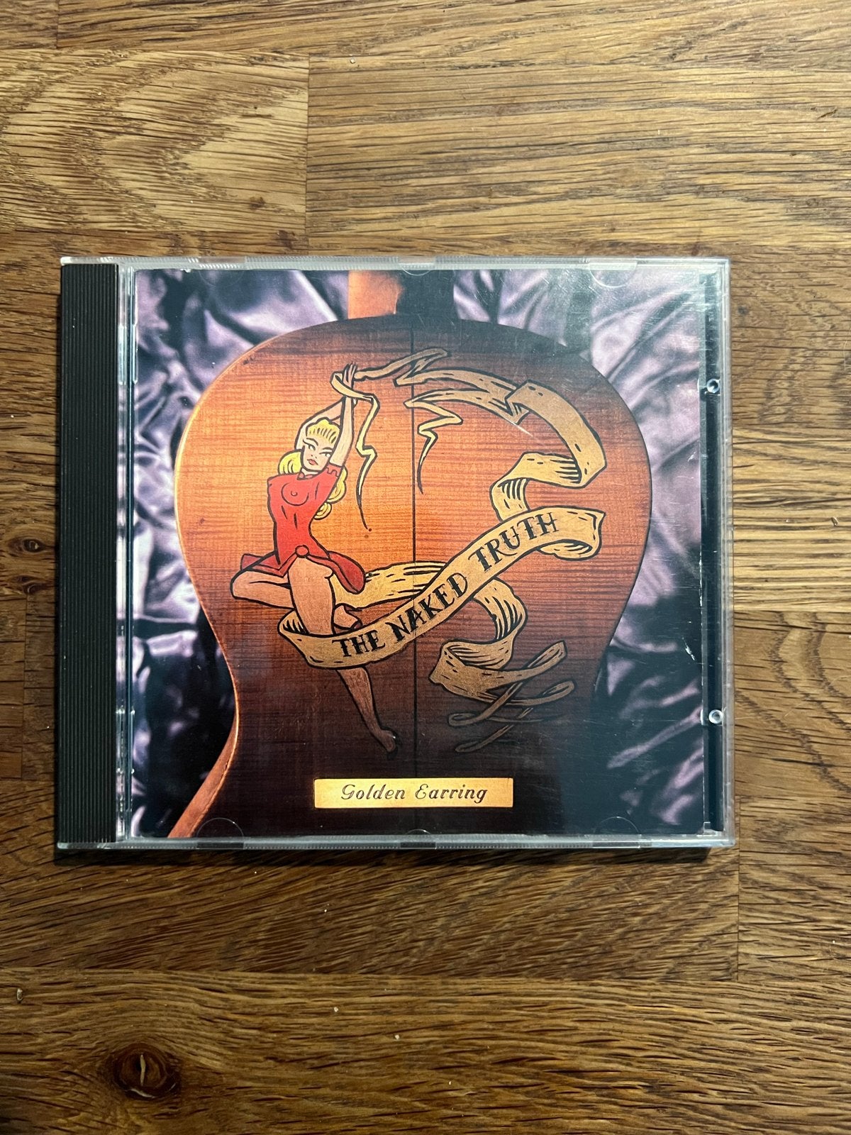 Golden Earring - The Naked Truth (CD), Ophalen of Verzenden, Zo goed als nieuw, Live-album, Inclusief boekje
