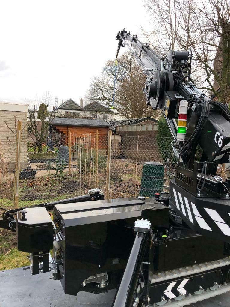 Hijskraan huren met machinist (compactkraan)