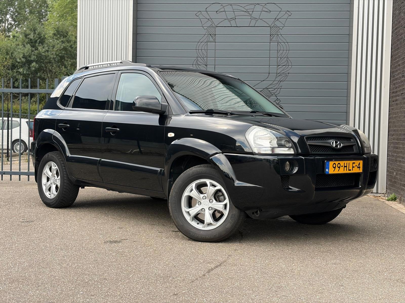 Hyundai Tucson 2.7i V6 4WD Style Automaat|Camera|Ecc, Automaat, Gebruikt, Zwart, 2656 cc