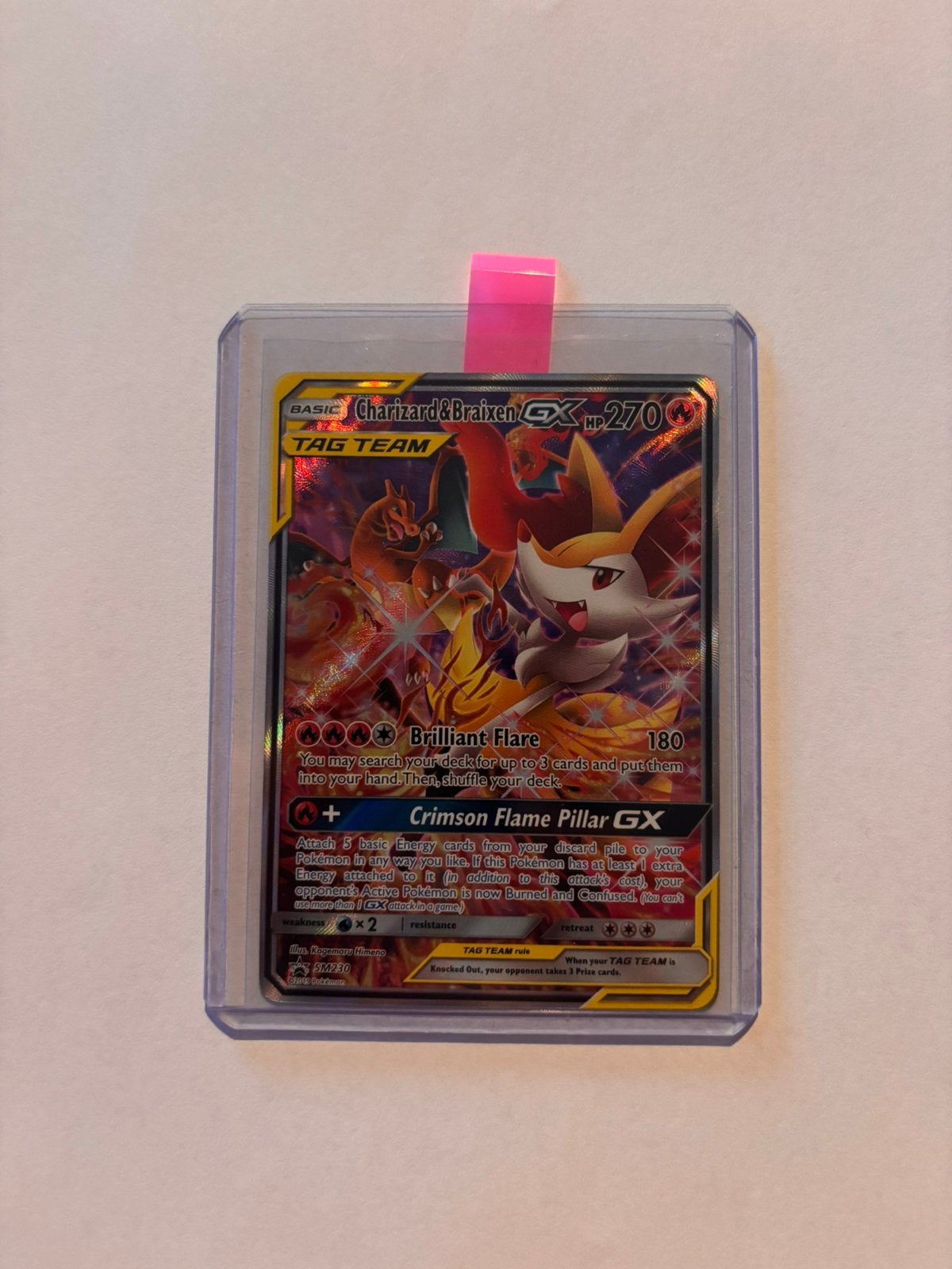 Charizard & Braixen GX SM230, Ophalen of Verzenden, Zo goed als nieuw