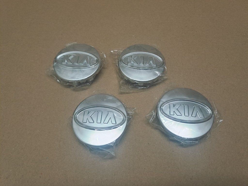 Set van 4 nieuwe originele naafkapjes Kia, Ophalen of Verzenden, Nieuw, Kia