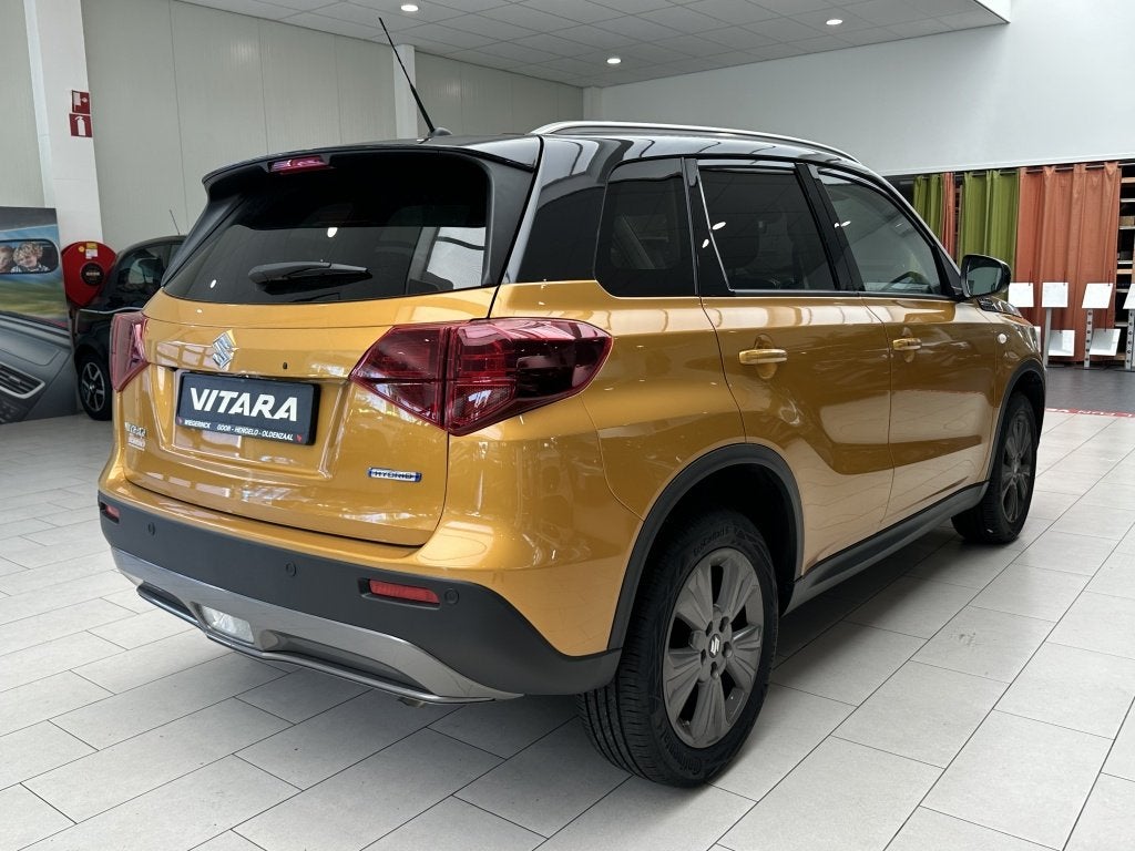 Suzuki Vitara 1.4 Boosterjet Hybride Select [ CAMERA I ADAPT, Auto's, Automaat, 12 maanden, Stof, Gebruikt