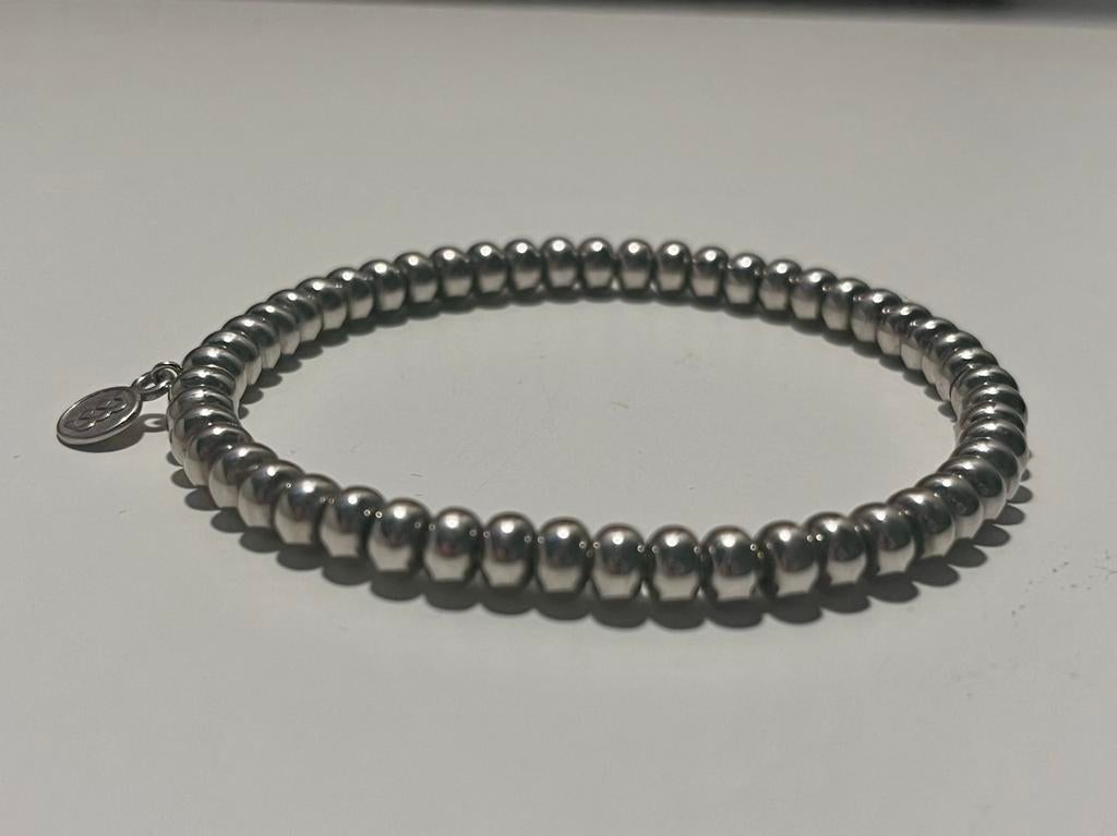 BRON reflex armband 5 mm 18kt witgoud “ kaasjes”, Ophalen of Verzenden, Zo goed als nieuw, Wit, Goud