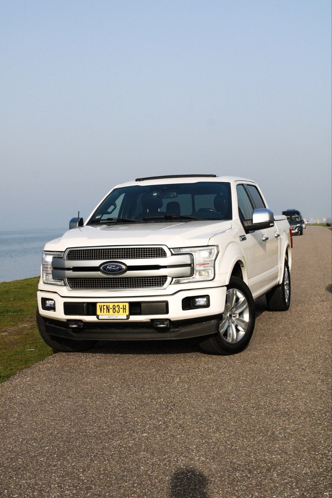 Ford F150 2021 Wit, Auto's, Bestelauto's, Automaat, Dealer onderhouden, 3500 kg, Wit