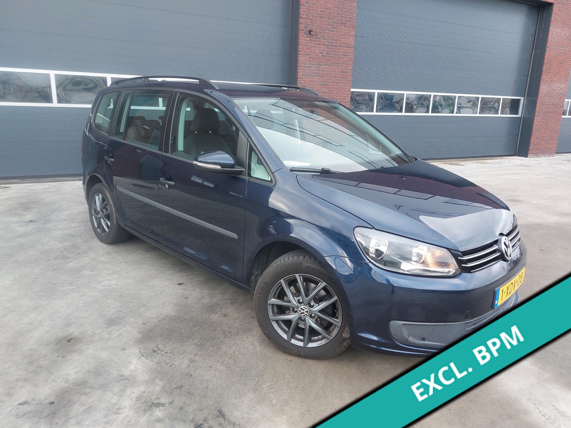 Volkswagen Touran 1.6 TDI Trendline BlueMotion7pers Airco/Na, Auto's, Volkswagen, Voorwielaandrijving, Euro 5, Gebruikt, Zwart