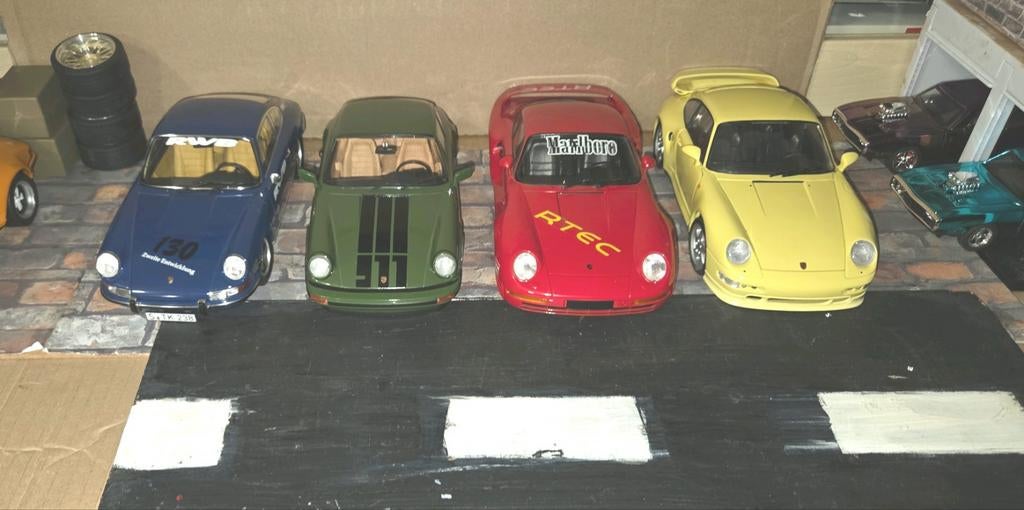 Porsches 4stuks Norev. Welly minichamps solido, Hobby en Vrije tijd, Modelauto's | 1:18, Ophalen of Verzenden, Zo goed als nieuw