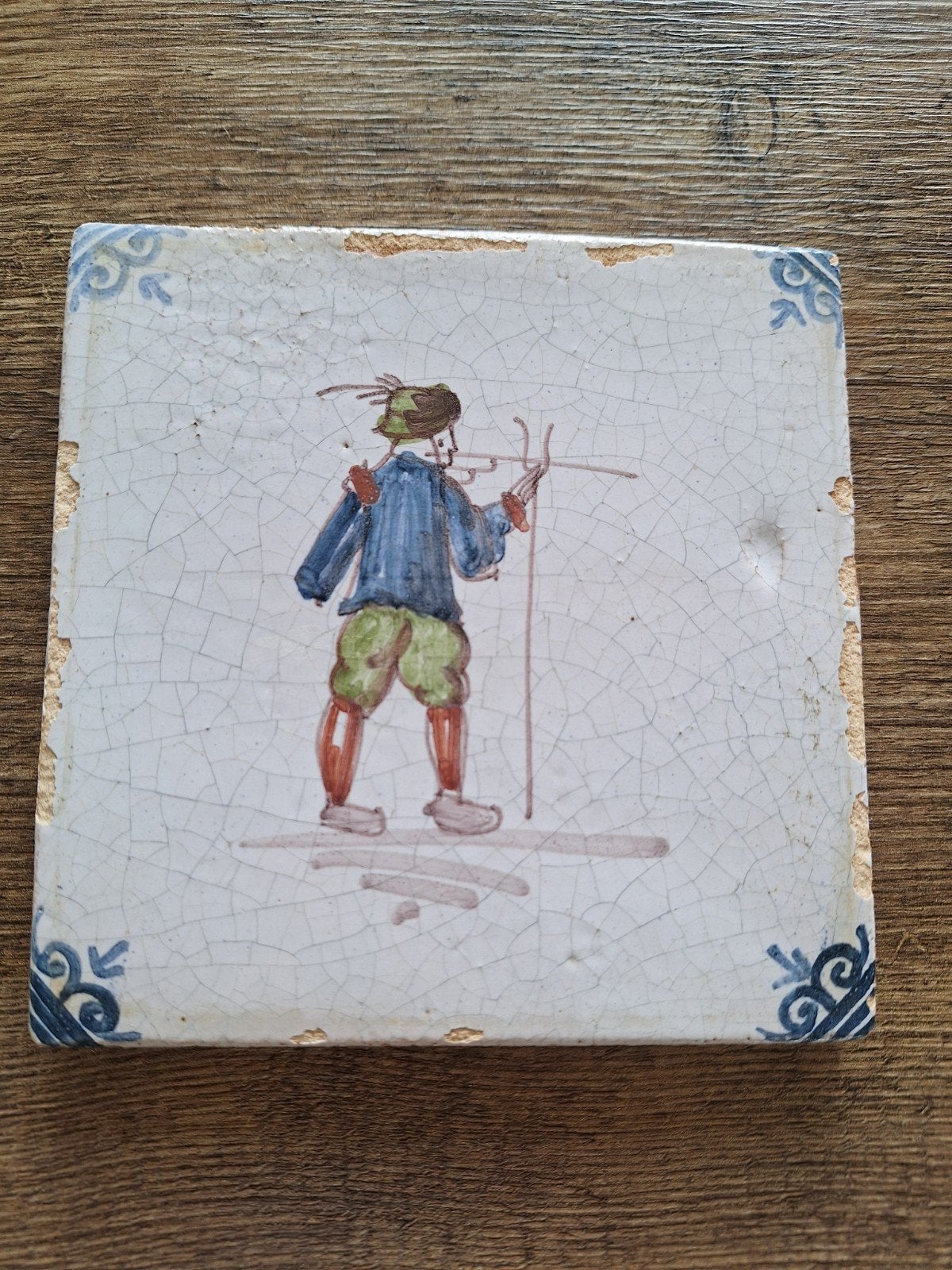Polychroom tegel "boer" witje, Ophalen of Verzenden