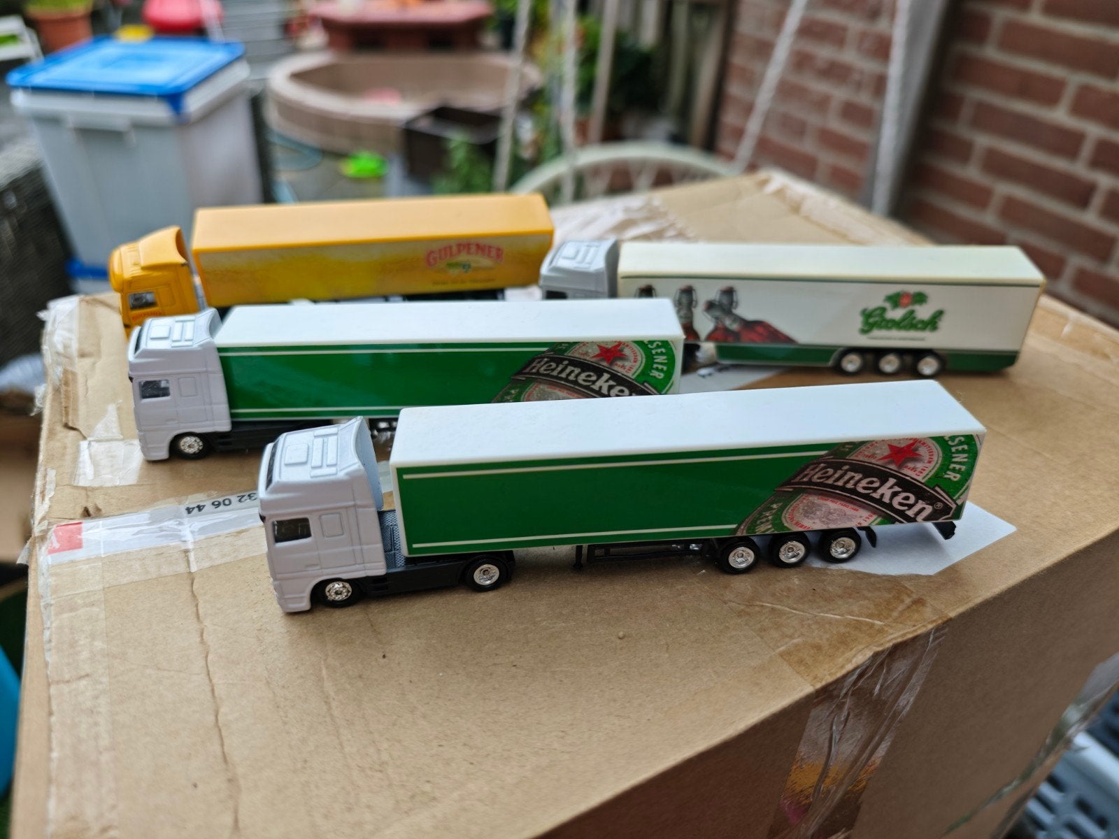 Miniatuur vrachtwagens Nederlandse biermerken., Ophalen of Verzenden, Heineken