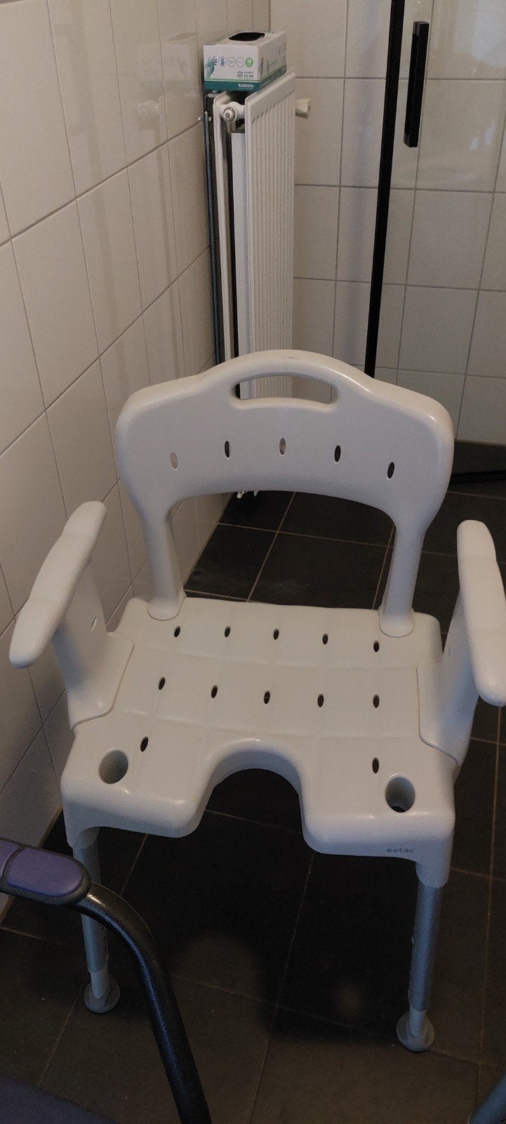 douchestoel, Ophalen
