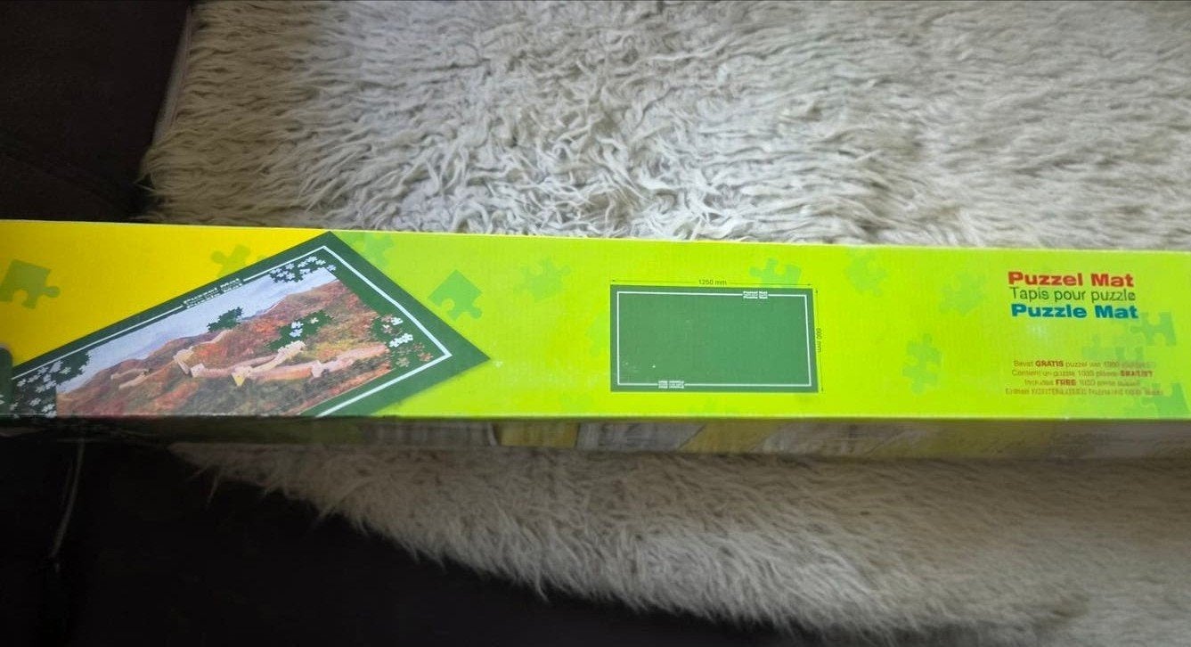 Puzzelmat met GRATIS 1000-stukjes puzzel, Hobby en Vrije tijd, Ophalen of Verzenden, 500 t/m 1500 stukjes, Nieuw, Legpuzzel