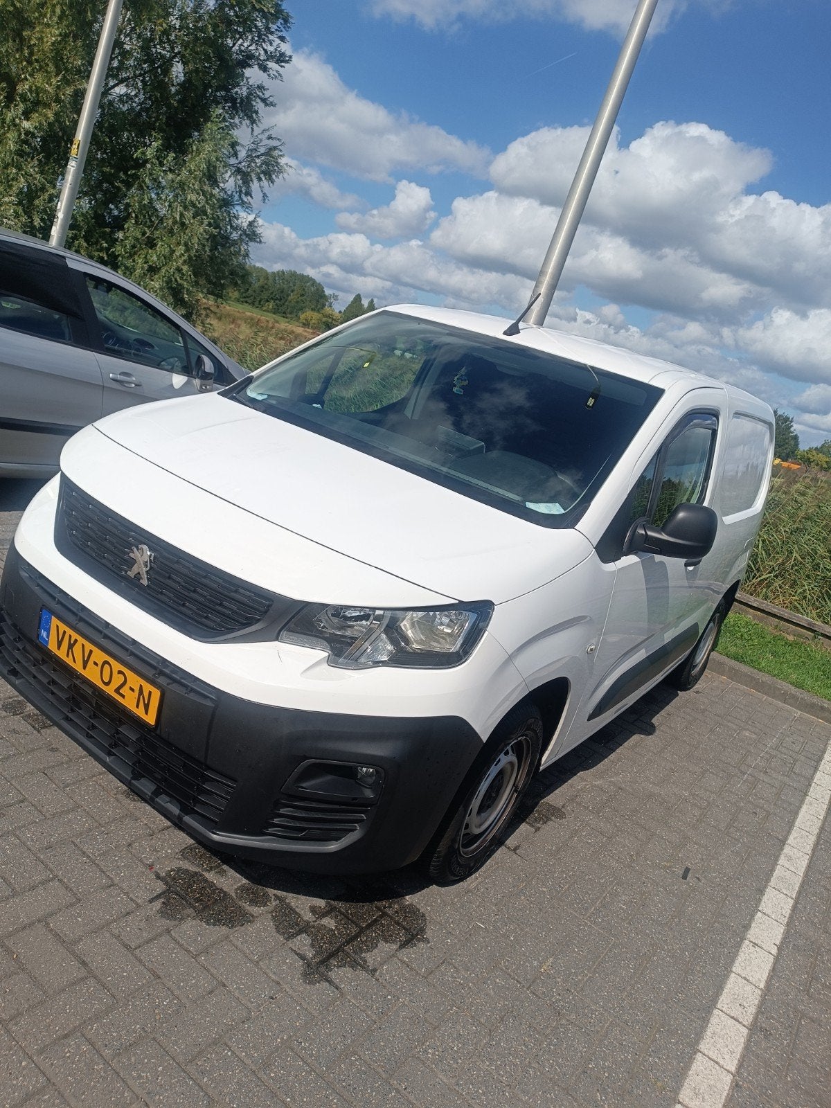 Peugeot Partner 1.2 Puretech 110pk S&S 1000kg 2021 Wit, Auto's, Voorwielaandrijving, 15 km/l, Overige bekleding, Wit