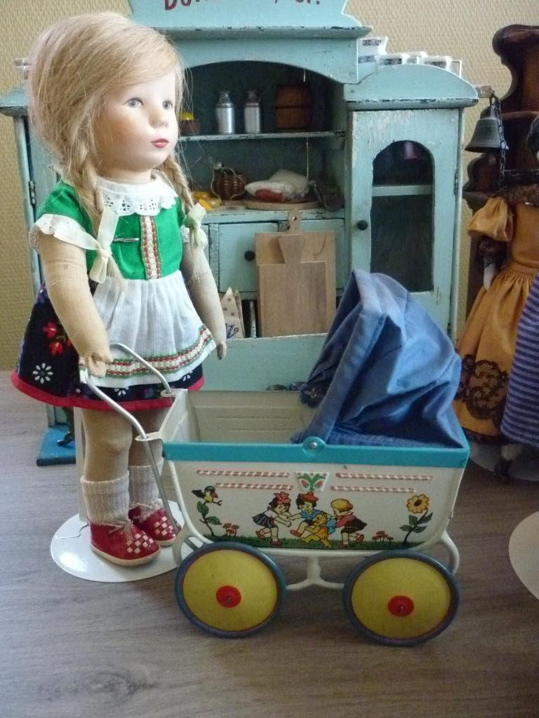 Oud blikken kinderwagentje en Käthe Kruse pop., Verzenden
